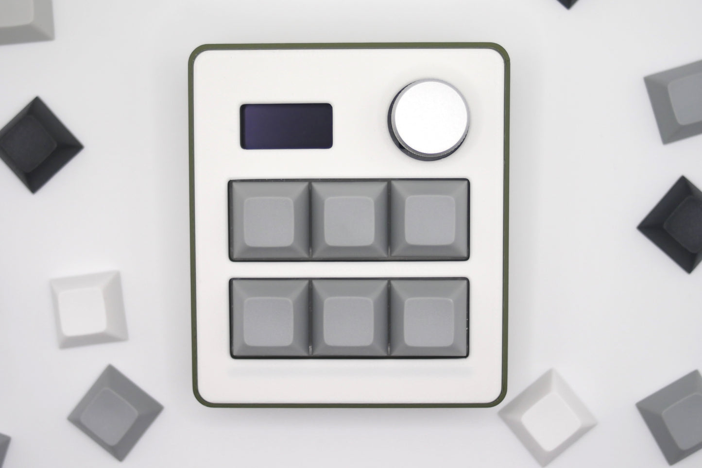 TogKey custom macropad for creators, gamers, and professionals in green and gray featuring a top down view