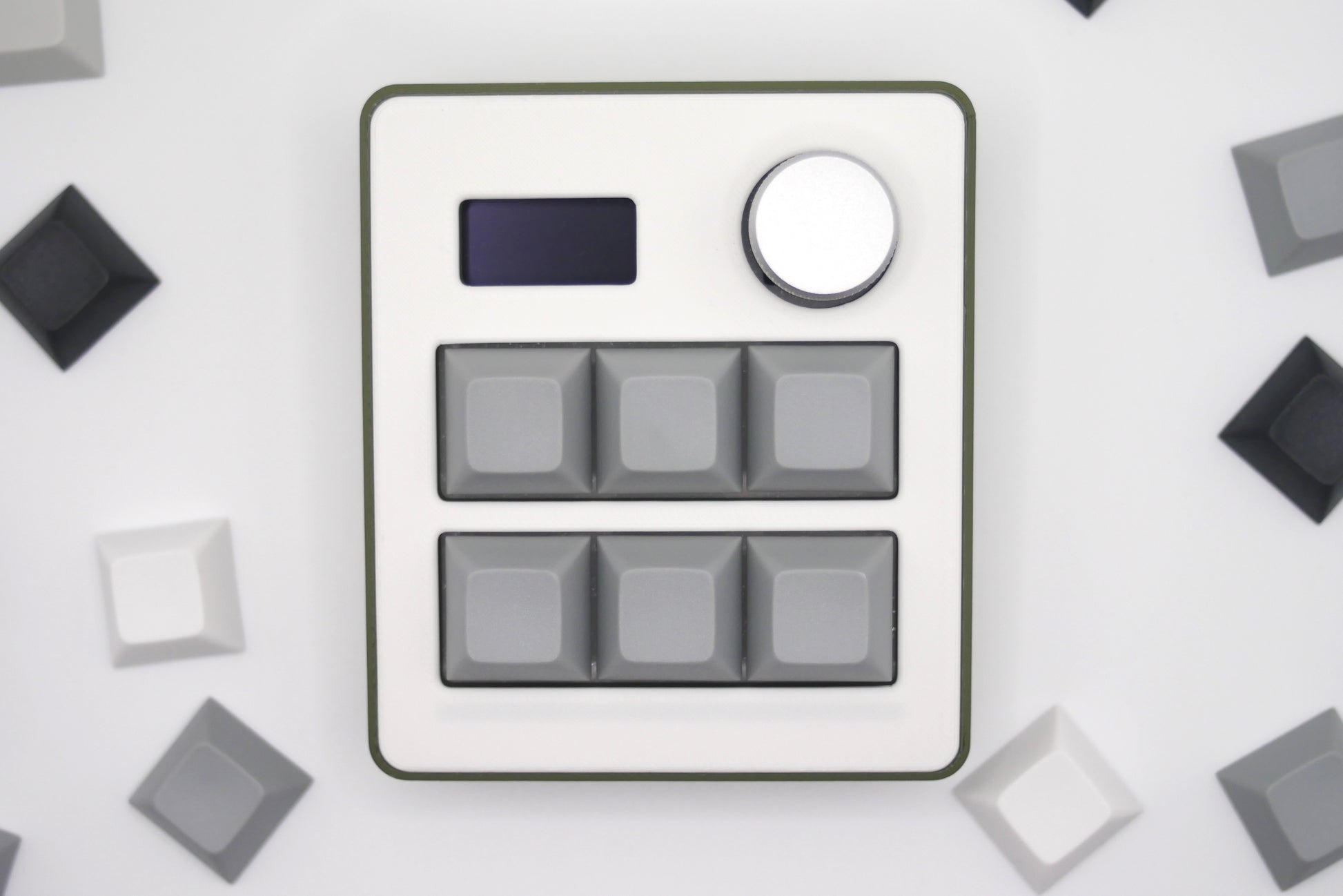 TogKey custom macropad for creators, gamers, and professionals in green and gray featuring a top down view