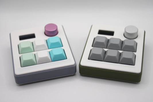 TogKey custom macropad for creators, gamers, and professionals in green and gray featuring a front view