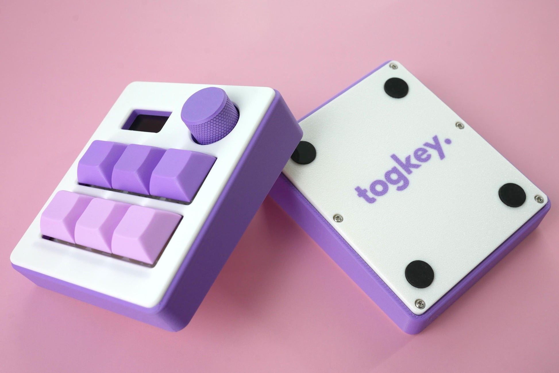 Togkey programmable macropad front and bottom view showing white and purple 3d-printed case rubber feet and encoder knob